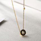 Rhea Numeral Disc Necklace